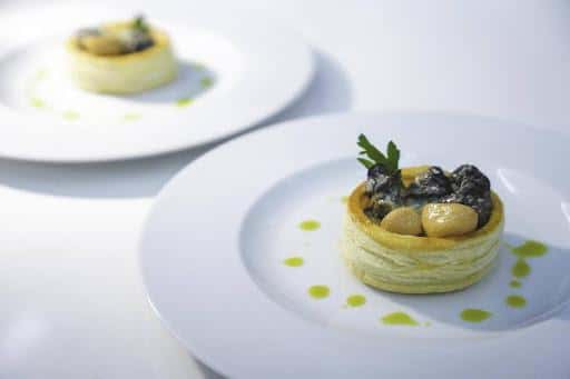 Escargot en Croute recipe served on a plate, by Bienvenue Restaurant