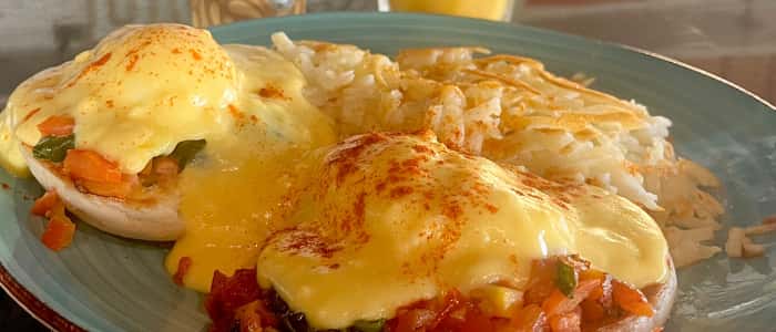 Eggs Florentine recipe served on a plate, by Daisy's Garage
