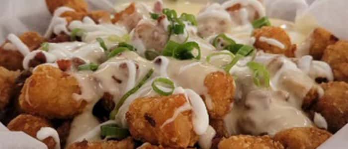 Tator Tots recipe served on a plate, by Daisy's Garage