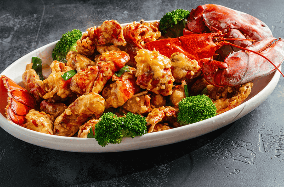 Golden Lobster recipe served on a plate, by Umi Sushi & Seafood Buffet