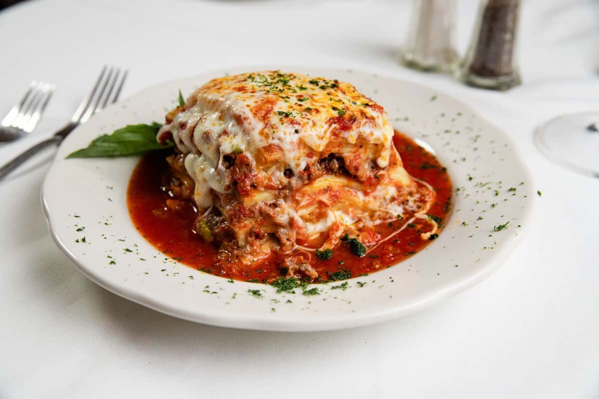 Lasagna recipe served on a plate, by Gino's Restaurant