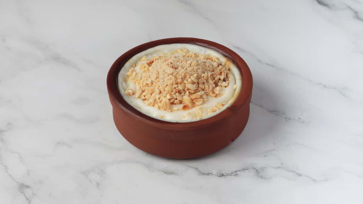 Rice Pudding (Sütlaç) recipe served on a plate, by Istanbul Grill House Turkish Restaurant