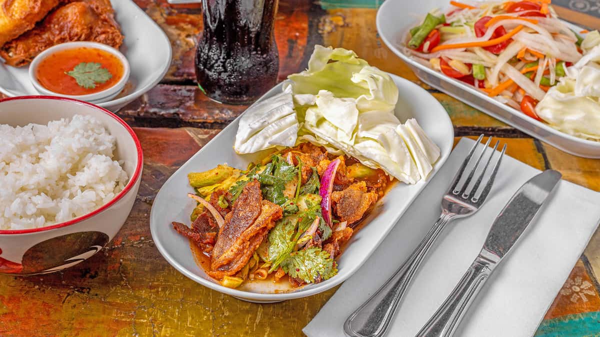 Duck Salad recipe served on a plate, by Lung Yai Thai Tapas