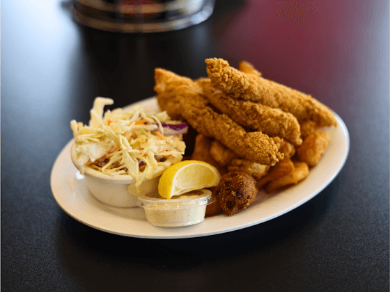 Fried Fish recipe served on a plate, by Mandez's Seafood Bar & Grill