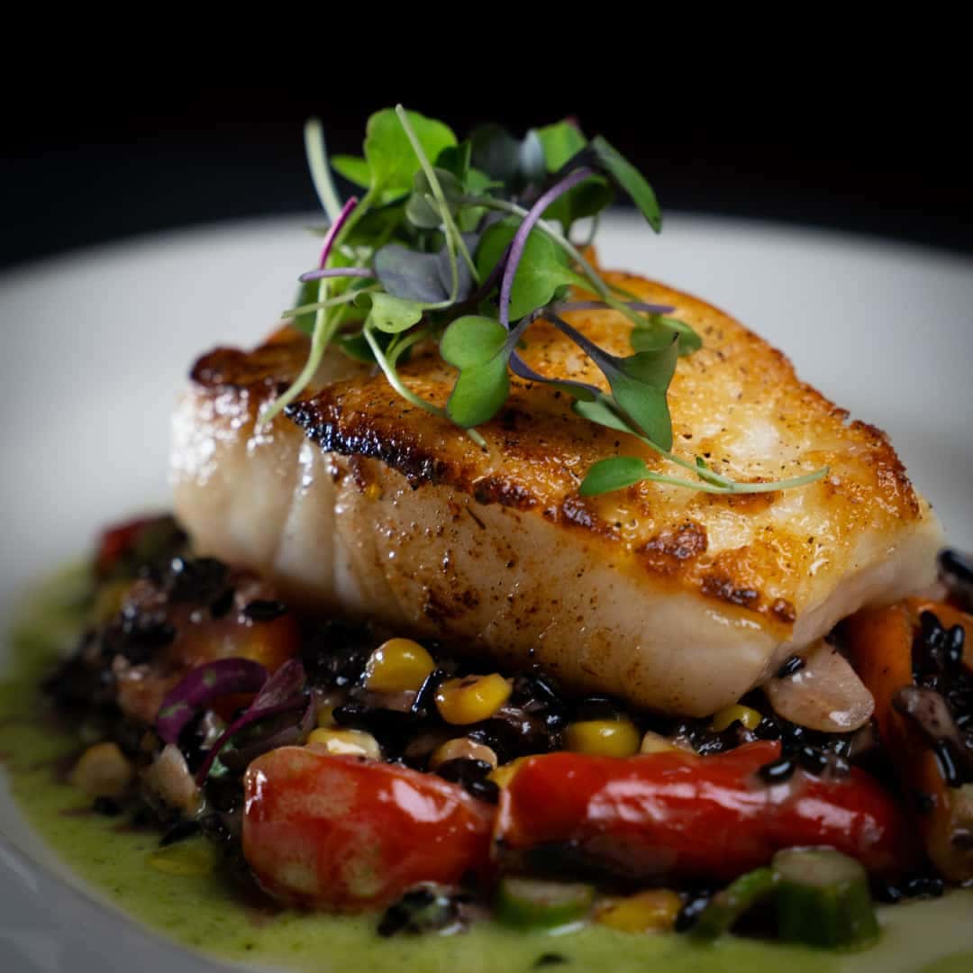 Chilean Seabass recipe served on a plate, by VAI's Italian Inspired Restaurant Kitchen + Bar