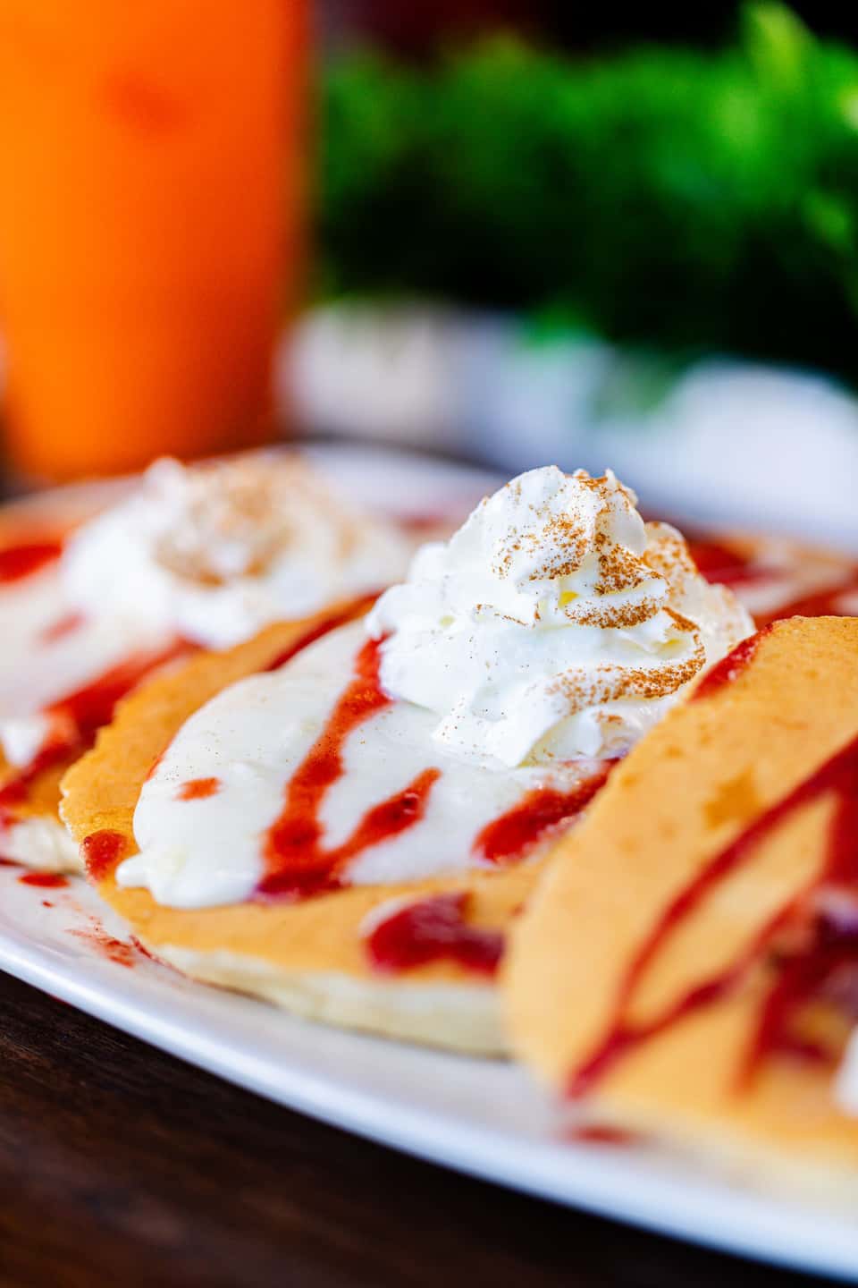 Strawberry Cheesecake Pancakes recipe served on a plate, by Urban Egg