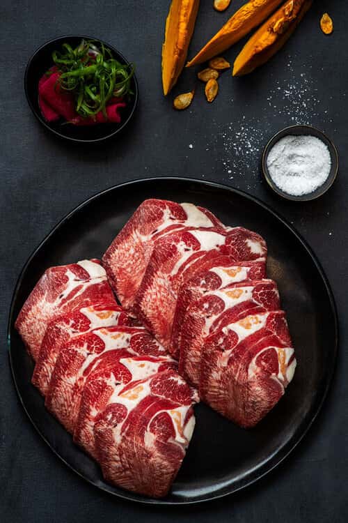 Prime Beef Tongue recipe served on a plate, by Baekjeong Temple City