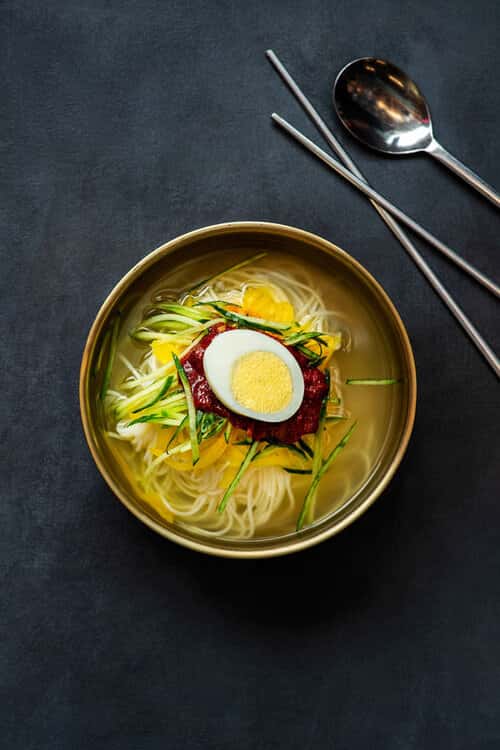Radish Kimchi Cold Noodles recipe served on a plate, by Baekjeong Temple City