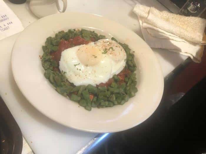 Andalusian Egg recipe served on a plate, by Goldy's Breakfast Bistro