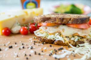 Sandwich recipe served on a plate, by Island Wing Company Grill & Bar - Tamaya Sandwich recipe served on a plate, by Island Wing Company Grill & Bar - Tamaya