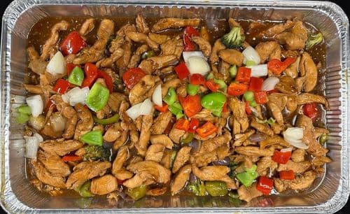 Chicken Teriyaki recipe served on a plate, by El Sabor Tropical Restaurant