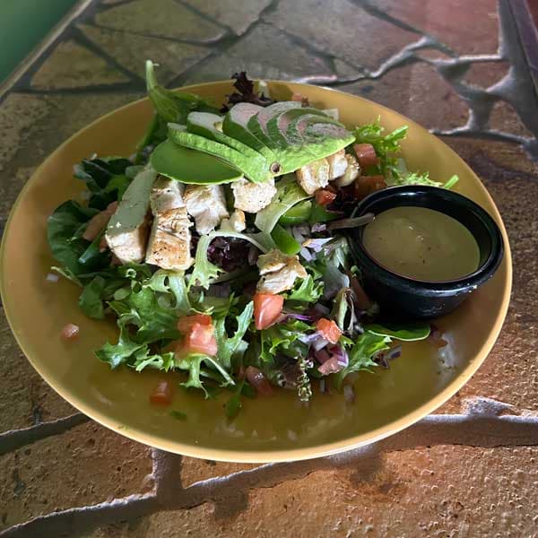 Salad recipe served on a plate, by Cabos Bonitos Grill & Cantina LLC Salad recipe served on a plate, by Cabos Bonitos Grill & Cantina LLC