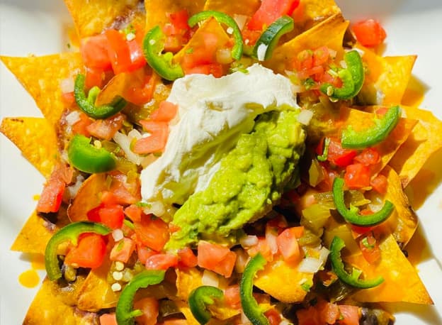 Nachos recipe served on a plate, by Casa Villa Restaurant