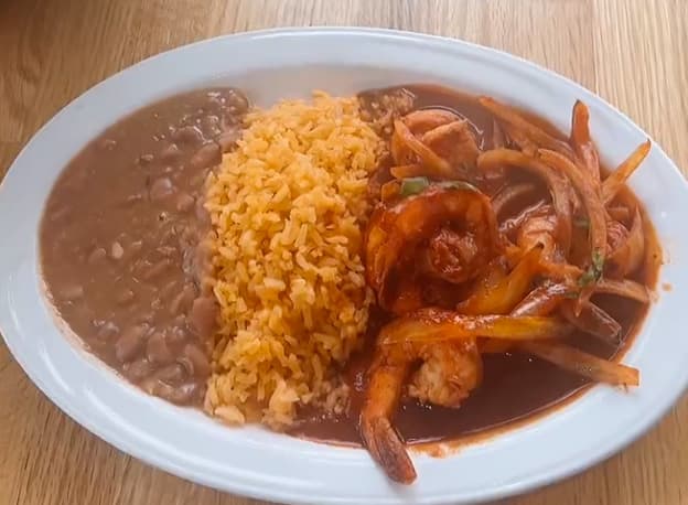 Camarones Enchipotlados recipe served on a plate, by Casa Villa Restaurant Camarones Enchipotlados recipe served on a plate, by Casa Villa Restaurant