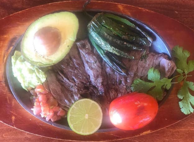 Carne Asada recipe served on a plate, by Casa Villa Restaurant