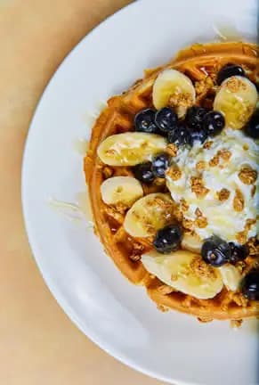 Banana Crunch Waffle recipe served on a plate, by Cosmos Restaurant Banana Crunch Waffle recipe served on a plate, by Cosmos Restaurant