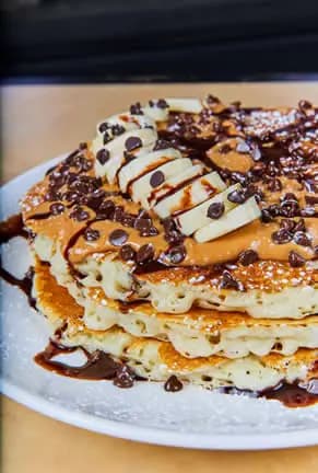 Elvis Pancakes recipe served on a plate, by Cosmos Restaurant