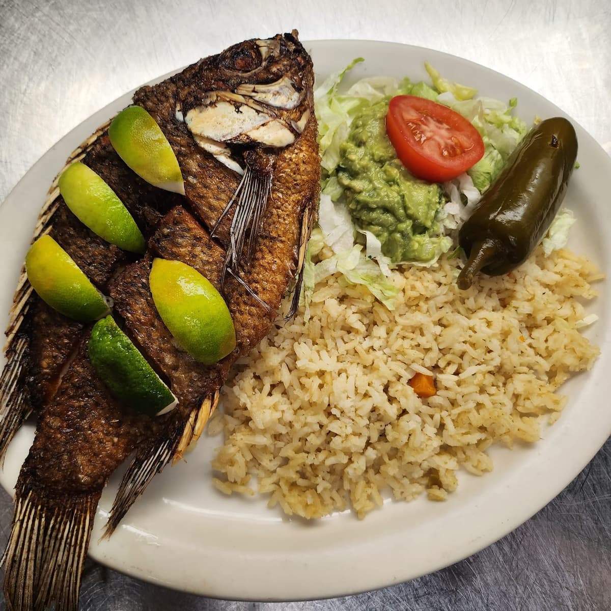 Fajitas recipe served on a plate, by El Mariachi Mexican Grill Fajitas recipe served on a plate, by El Mariachi Mexican Grill