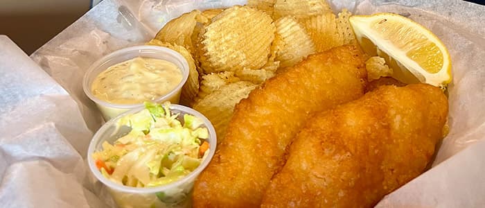 Fish and Chips recipe served on a plate, by Daisy's Garage