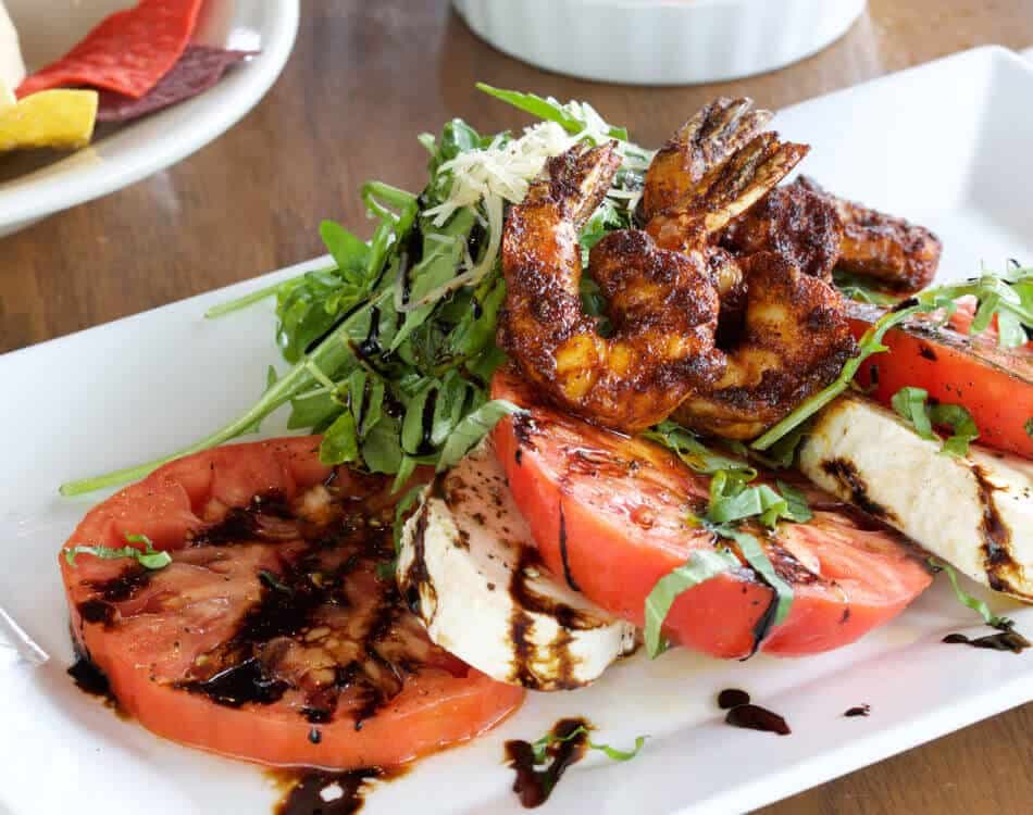Mozzarella Salad recipe served on a plate, by Doc Ford's Rum Bar & Grille