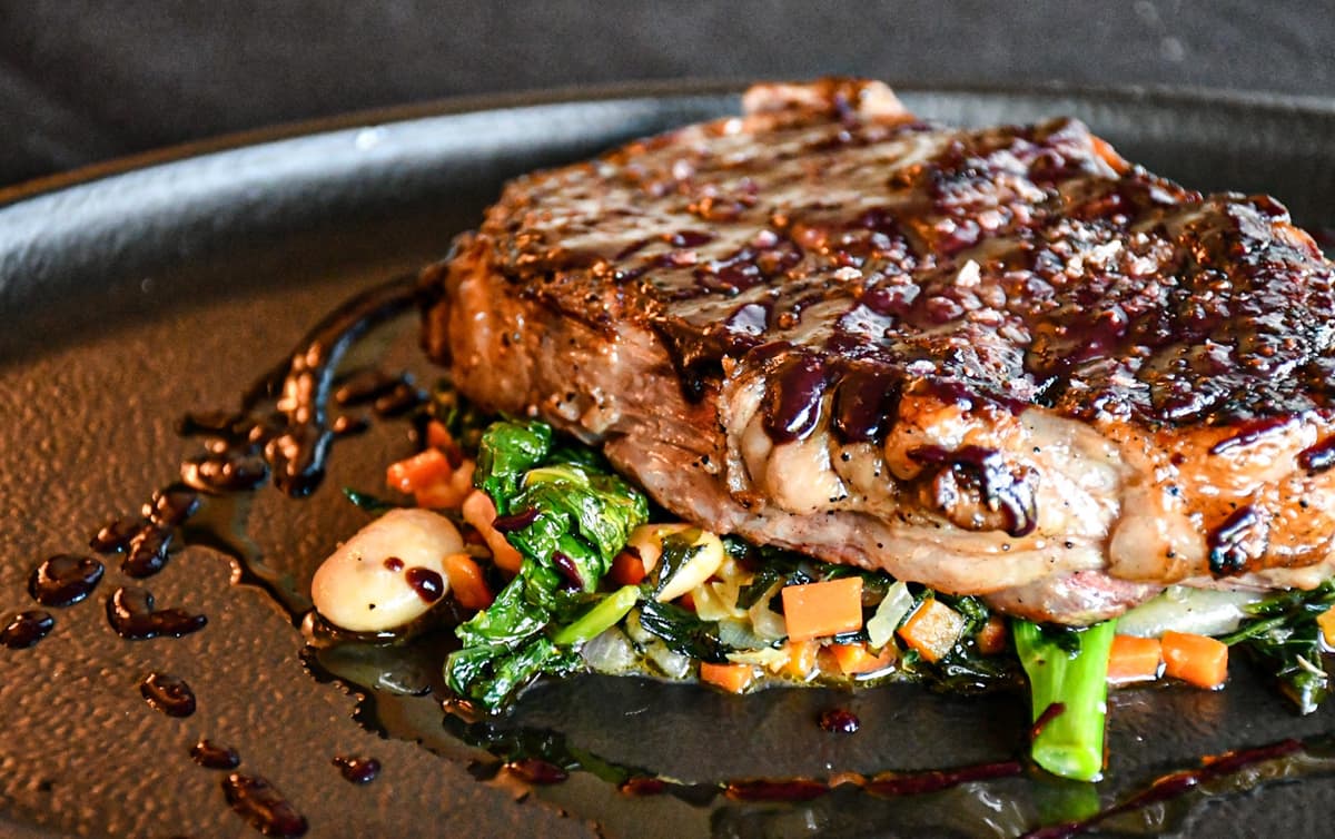 Steak recipe served on a plate, by Forepaugh's Restaurant