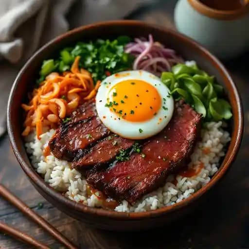 Korean BBQ Short-Rib Ricebowl recipe served on a plate, by Pinwheel Garden Dumpling and Noodle Bar