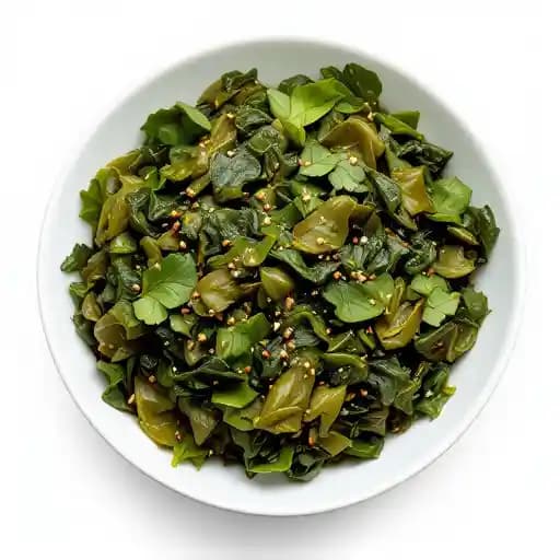 Collard Greens recipe served on a plate, by Golden rule cafe