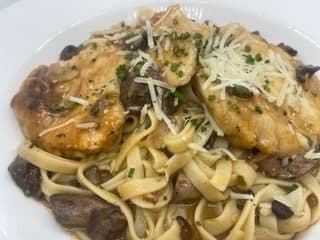 Chicken Marsala recipe served on a plate, by Napoli Italian Eatery