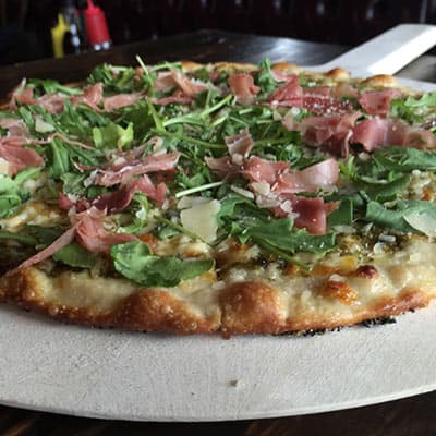 Pepperoni Pizza recipe served on a plate, by Kailua Town Pub and Grill Pepperoni Pizza recipe served on a plate, by Kailua Town Pub and Grill