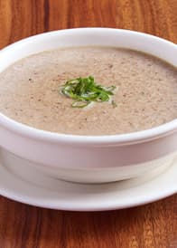 Mushroom Soup recipe served on a plate, by la Madeleine
