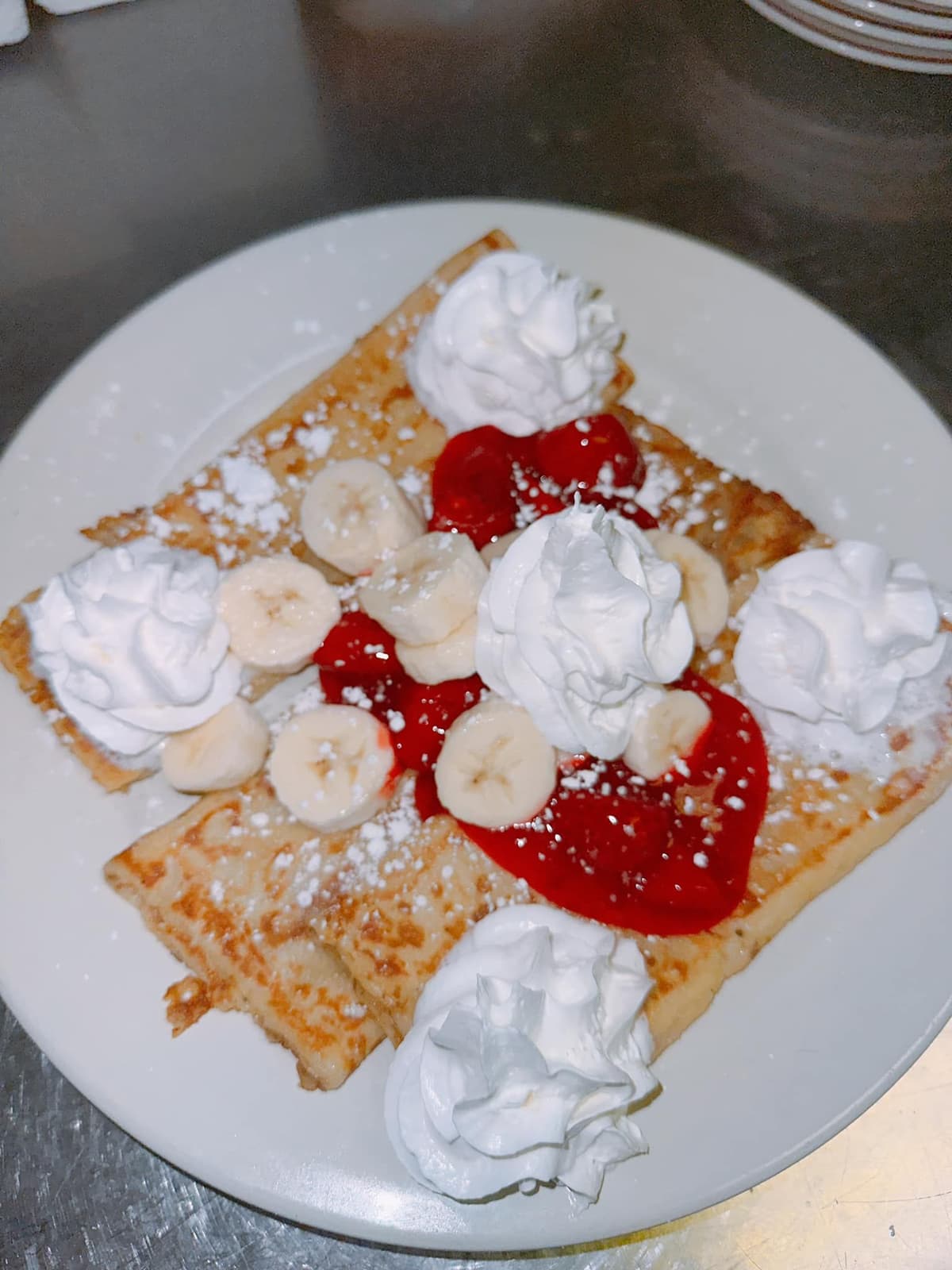 Crepe recipe served on a plate, by Star 66 Cafe