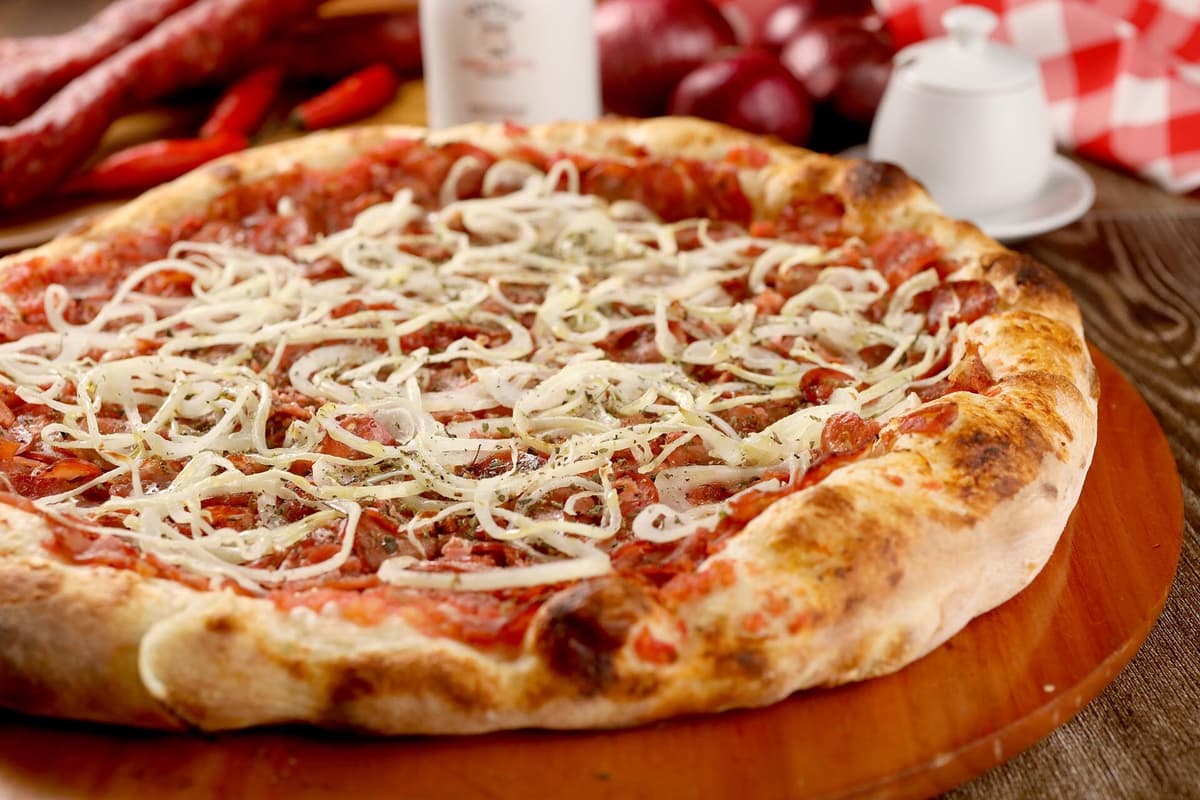 Pizza Calabrese recipe served on a plate, by Margherita Pizzeria Pizza Calabrese recipe served on a plate, by Margherita Pizzeria