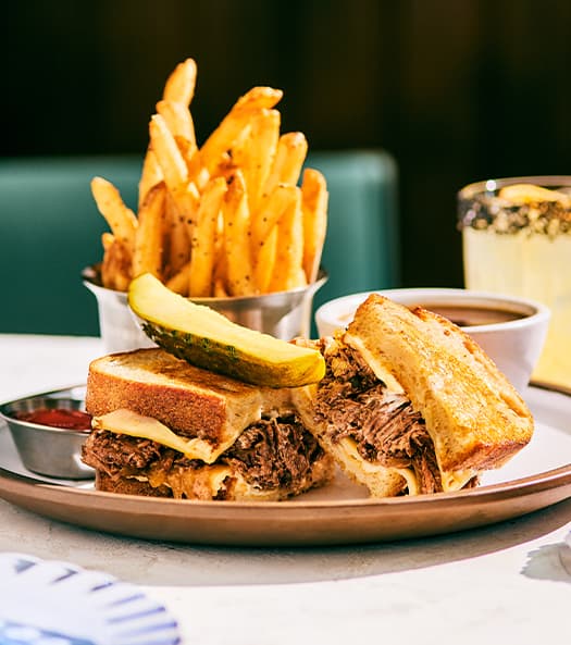 Shortrib Beef Dip recipe served on a plate, by Moxies Orleans Restaurant