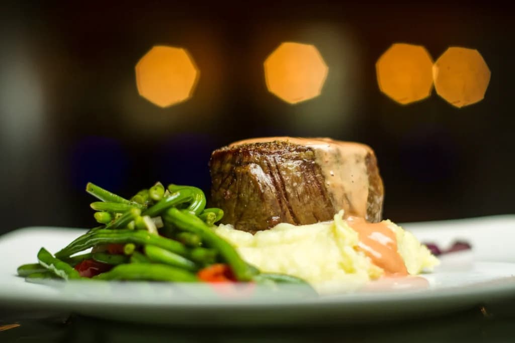 New Steak recipe served on a plate, by Fire & Ice Restaurant & Bar
