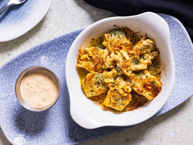 Artichokes recipe served on a plate, by The Sacred Pepper