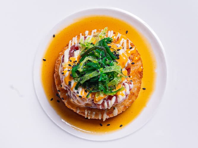 Crab Cake recipe served on a plate, by The Sacred Pepper