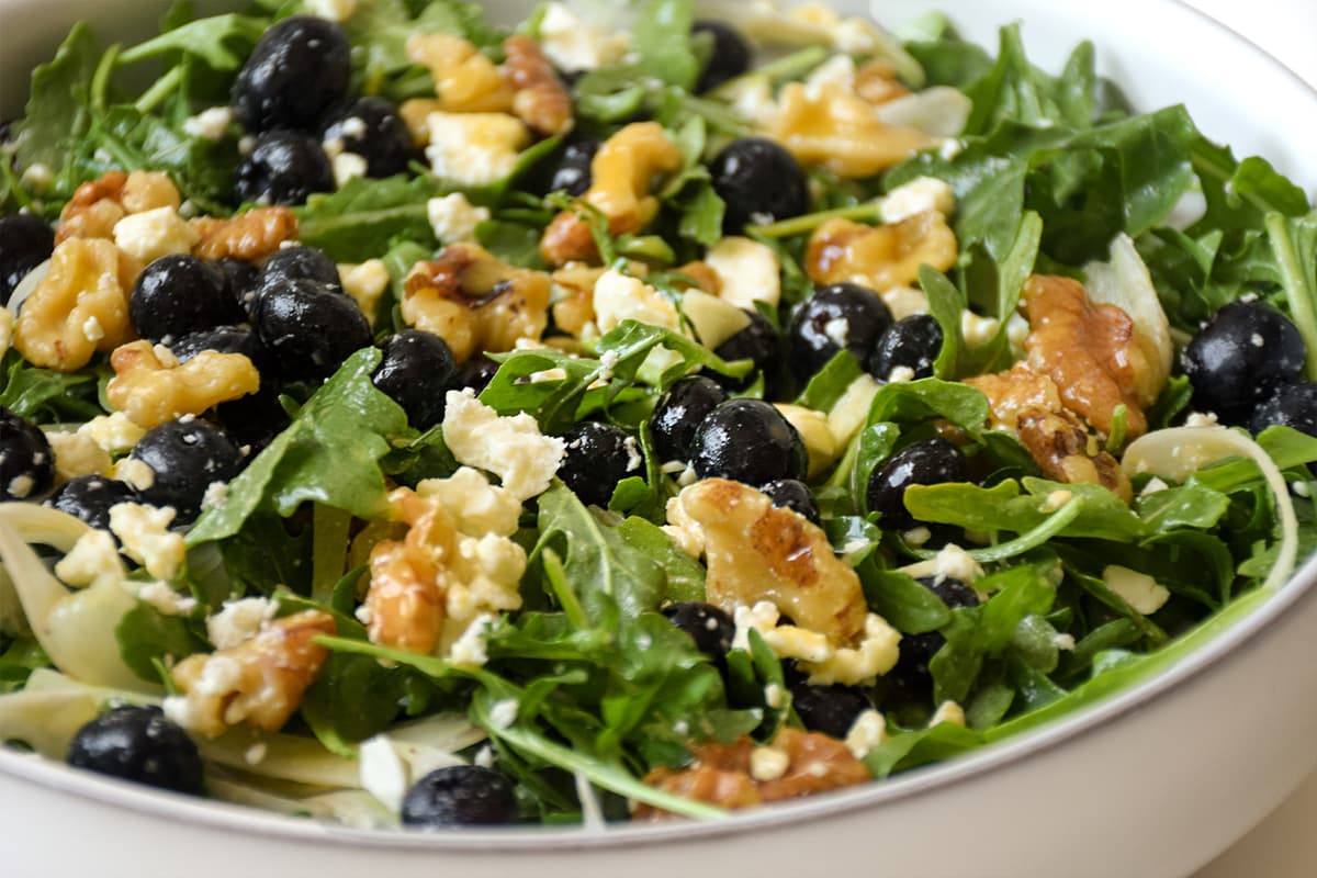 Seasonal Mixed Greens recipe served on a plate, by Blue Water Cafe