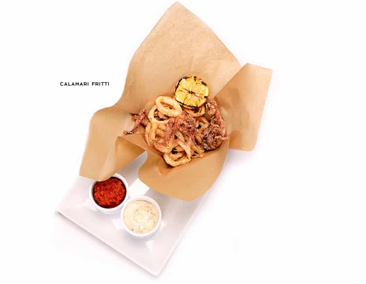 Calamari Fritti recipe served on a plate, by Romano's Macaroni Grill Calamari Fritti recipe served on a plate, by Romano's Macaroni Grill