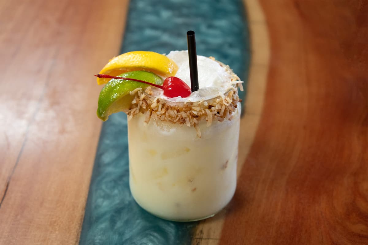 Frozen Coconut Margarita recipe served in a glass, by Sadie's of New Mexico Frozen Coconut Margarita recipe served in a glass, by Sadie's of New Mexico