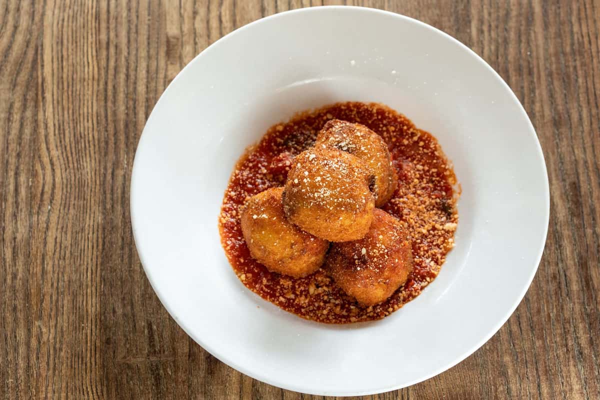 Side of Meatballs recipe served on a plate, by Cavo's Bar & Kitchen Side of Meatballs recipe served on a plate, by Cavo's Bar & Kitchen