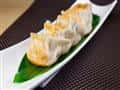 Potstickers recipe served on a plate, by Ho Ping House Potstickers recipe served on a plate, by Ho Ping House