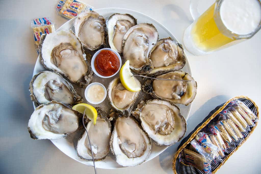Oysters recipe served on a plate, by The Chimes Lafayette Oysters recipe served on a plate, by The Chimes Lafayette