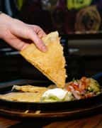 Chicken Nachos recipe served on a plate, by Nacho Daddy - Salt Lake City Chicken Nachos recipe served on a plate, by Nacho Daddy - Salt Lake City