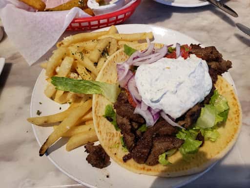 Fresh Ingredients recipe served on a plate, by Yamas Mediterranean Cuisine Fresh Ingredients recipe served on a plate, by Yamas Mediterranean Cuisine