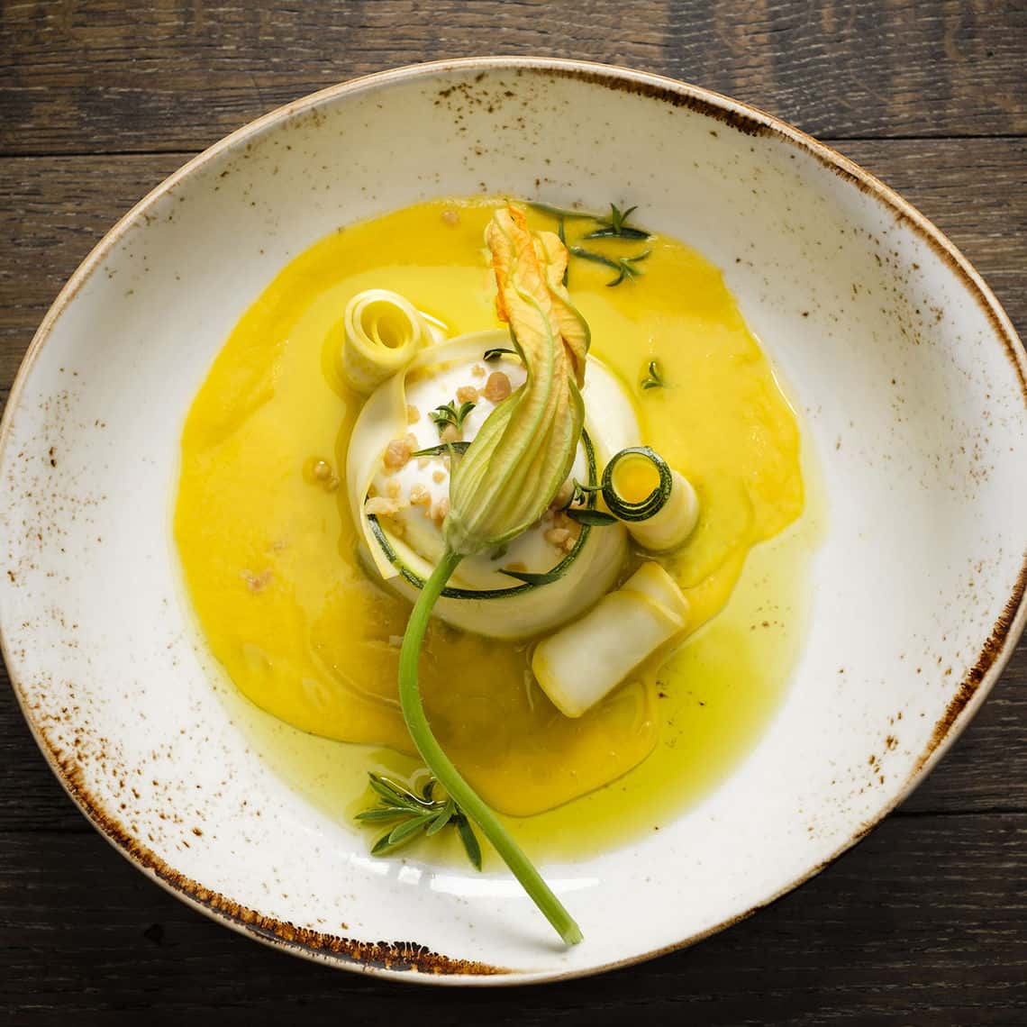 Squash Blossom Burrata recipe served on a plate, by B&O American Brasserie Squash Blossom Burrata recipe served on a plate, by B&O American Brasserie