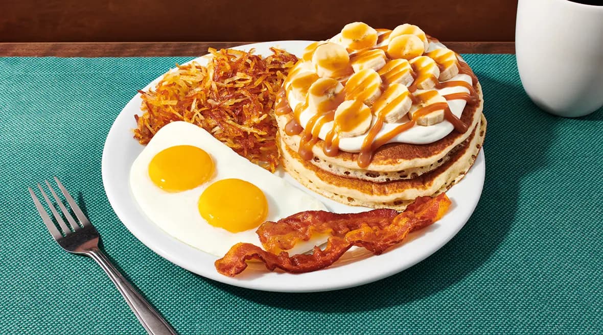 Salted Caramel Banana Pancake Slam recipe served on a plate, by Denny's Salted Caramel Banana Pancake Slam recipe served on a plate, by Denny's