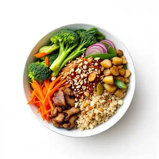Teriyaki Quinoa Bowl recipe served on a plate, by True Food Kitchen Teriyaki Quinoa Bowl recipe served on a plate, by True Food Kitchen