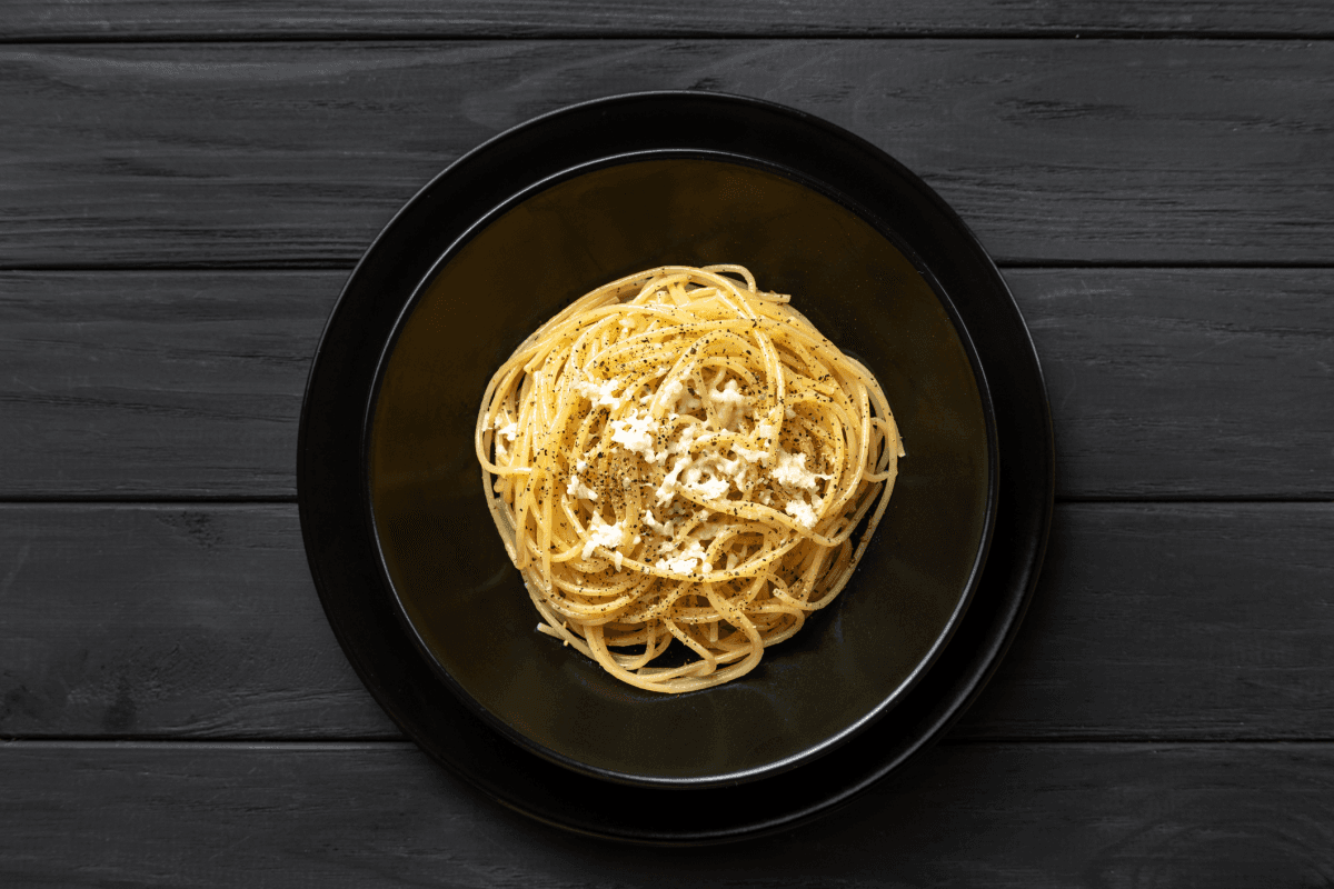 Cacio e Pepe recipe served on a plate, by The Bellwether Cacio e Pepe recipe served on a plate, by The Bellwether