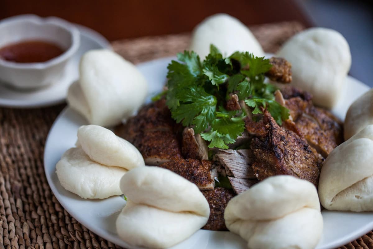 Wild Ginger Fragrant Duck recipe served on a plate, by Wild Ginger Downtown Seattle Wild Ginger Fragrant Duck recipe served on a plate, by Wild Ginger Downtown Seattle