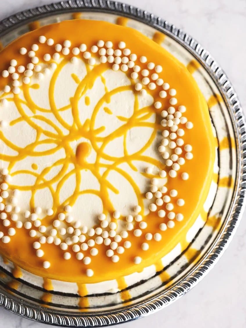 Mango Tres Leches recipe served on a plate, by Cafe Latte Mango Tres Leches recipe served on a plate, by Cafe Latte